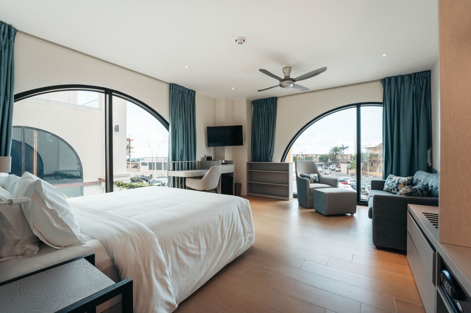 There is a large bed in the middle of the room.