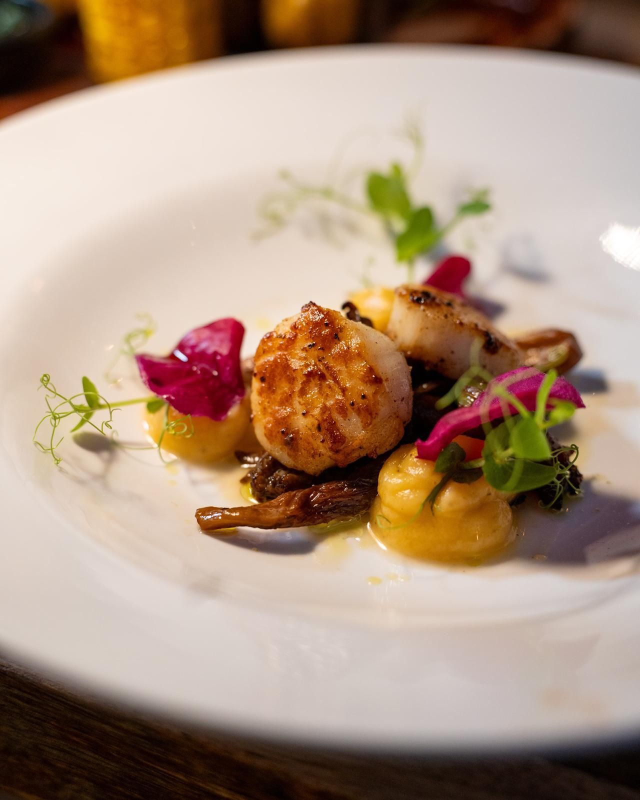 A close up of a plate of food on a table.