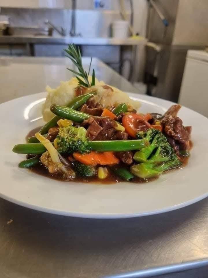 A neatly plated dish features a generous portion of tender — Tre's Carvery in Mount Sheridan, QLD