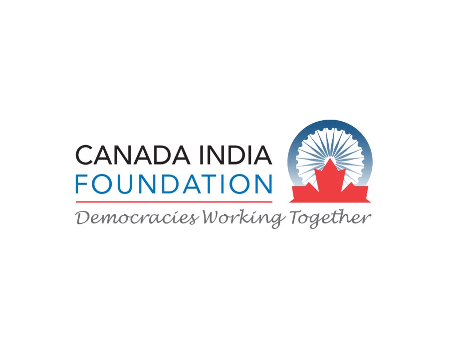 Logo for the Canada India Foundation, with a red maple leaf and an Indian Ashoka Chakra design. Text reads