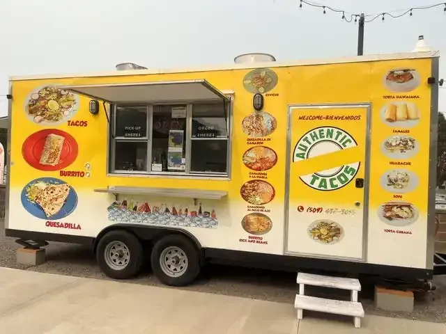 Yellow and white food truck with 
