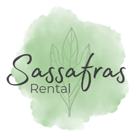 A logo for sassafras rental with a green background