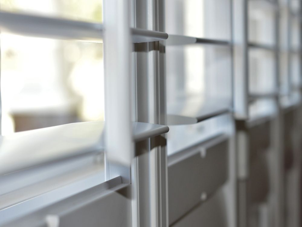 A Close Up of a Window With a Metal Railing — Budget Screens & Awnings in South Lismore, NSW