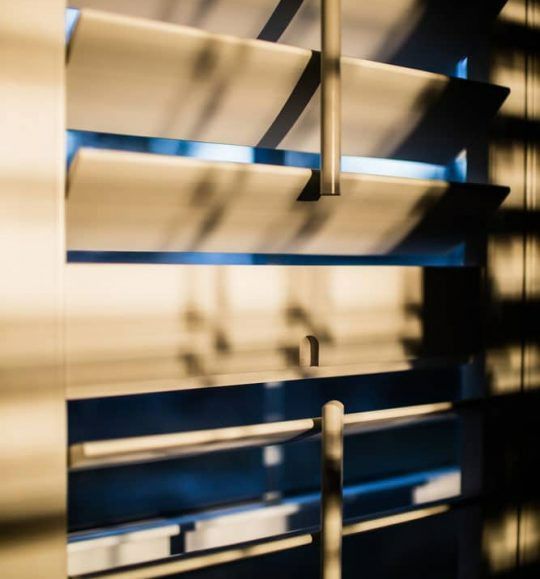 A Close Up of a Window With Blinds on It — Budget Screens & Awnings in South Lismore, NSW