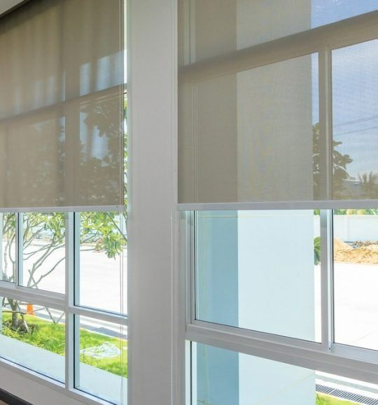 A Room With a Lot of Windows and Blinds on Them — Budget Screens & Awnings in South Lismore, NSW