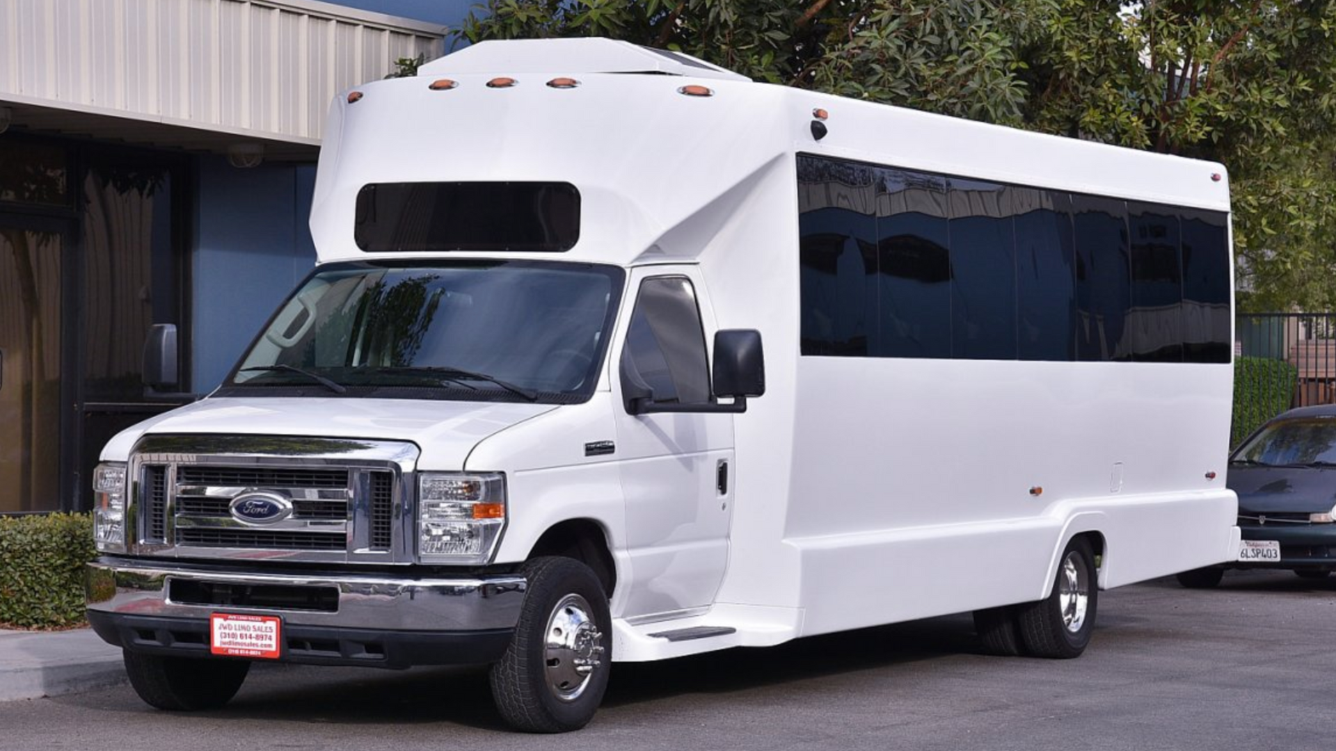 A black van is parked on a white background.