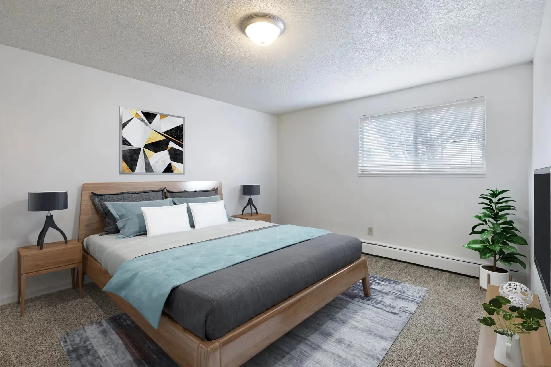 Bedroom in a modern apartment with a wooden bed, nightstands, lamps, and a window at Avec Greeley.