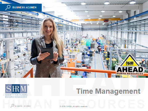 Factory floor with woman holding clipboard, and text reading