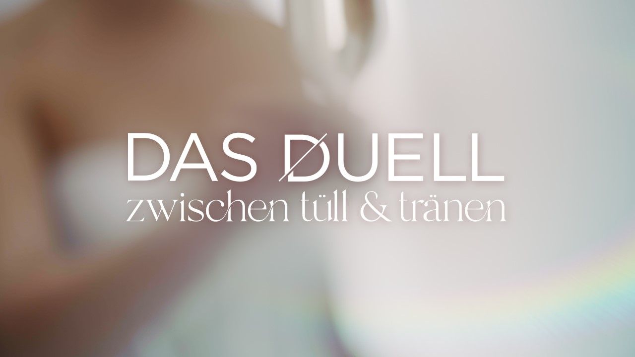 Eine Nahaufnahme der Hand einer Person mit den Worten „Das Duell“ darauf geschrieben
