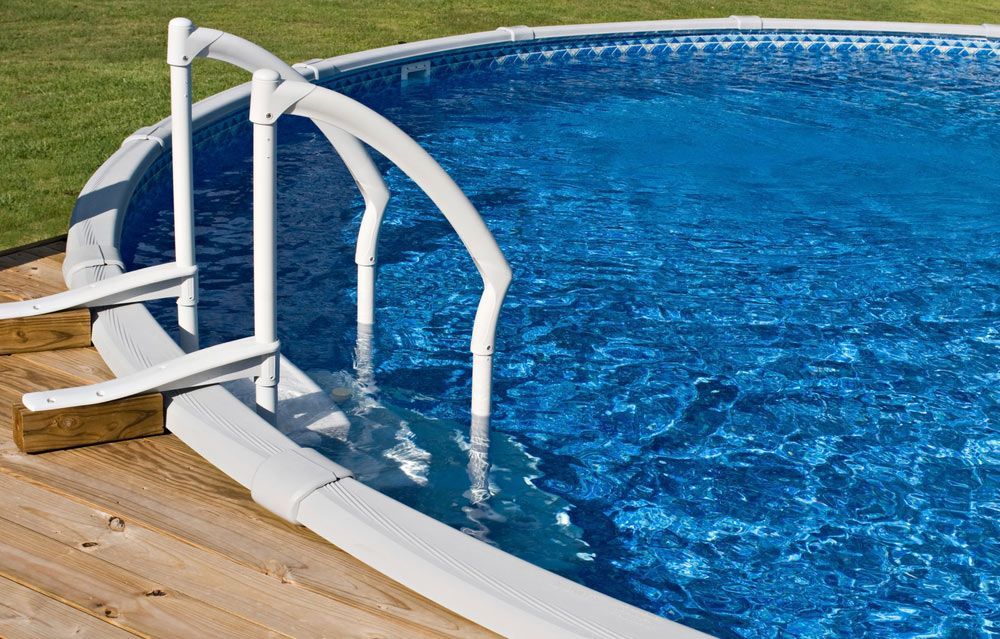 Clear Swimming pool with stairs — Pool Cleaning in Smithfield, QLD