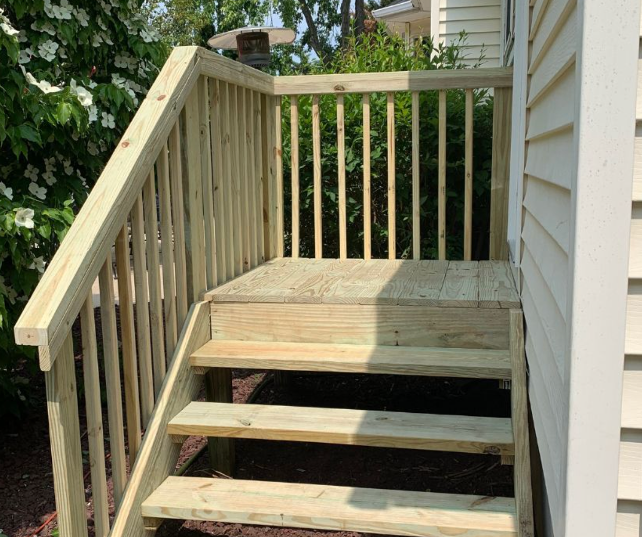 Custom-built exterior stairs and deck by Sayreville NJ handyman pros
