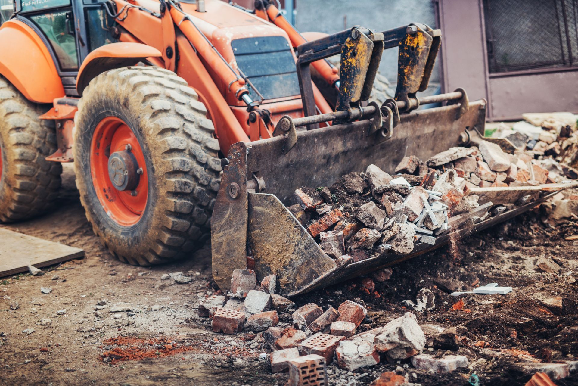 bulldozer cleaning up trash