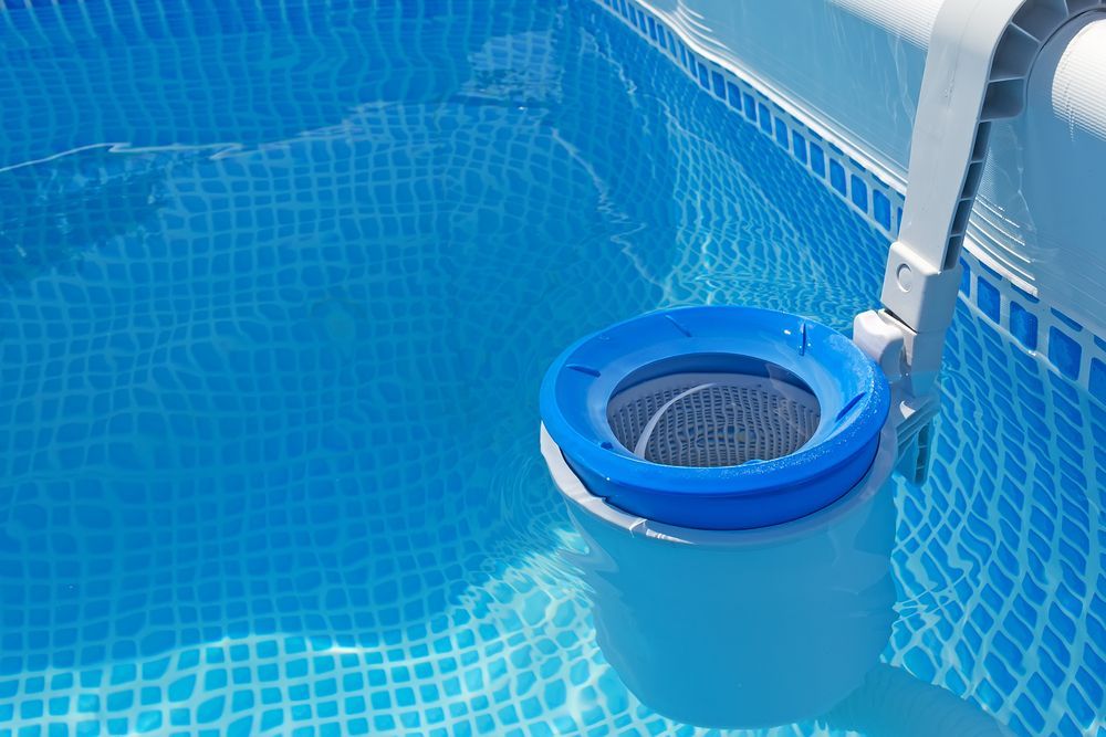 A Swimming Pool With A Skimmer Attached To The Side Of It — Ballina Pool Shop In Ballina, NSW