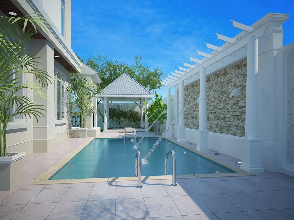 A Large Swimming Pool In The Backyard Of A House — Ballina Pool Shop In Ballina, NSW