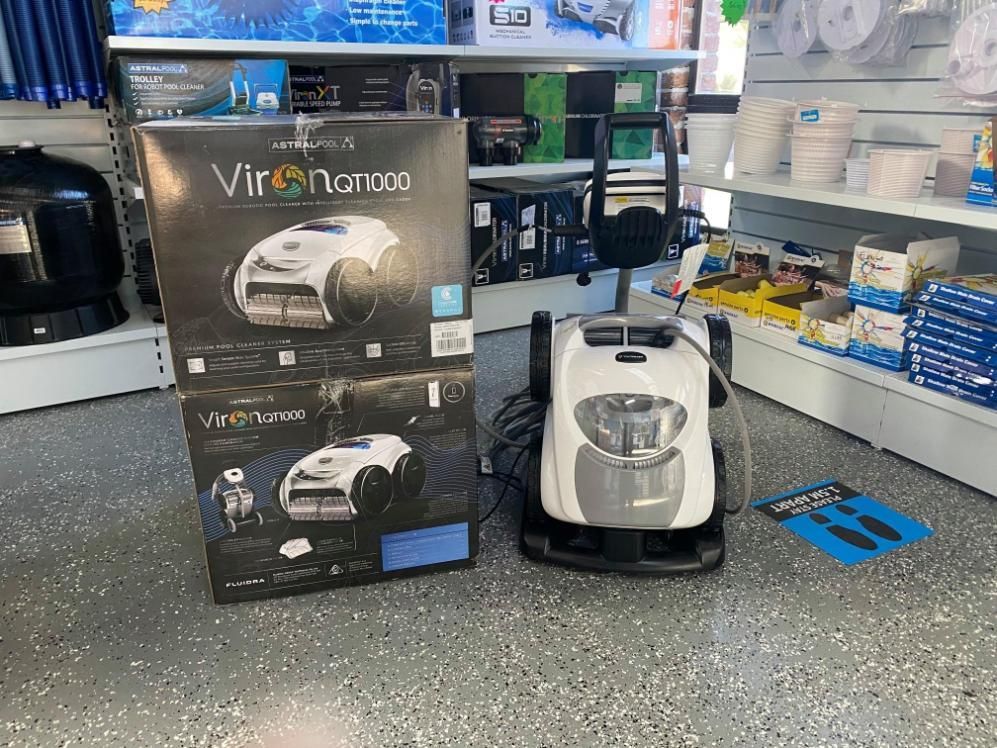 A Vacuum Cleaner Is Sitting Next To A Box In A Store — Ballina Pool Shop In Ballina, NSW