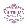 Victorian Nail Salon & Spa logo in purple script with ornate decorative flourishes
