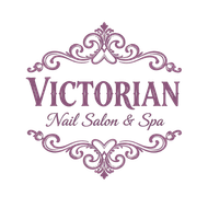 Victorian Nail Salon & Spa logo in mauve with ornate decorative flourishes
