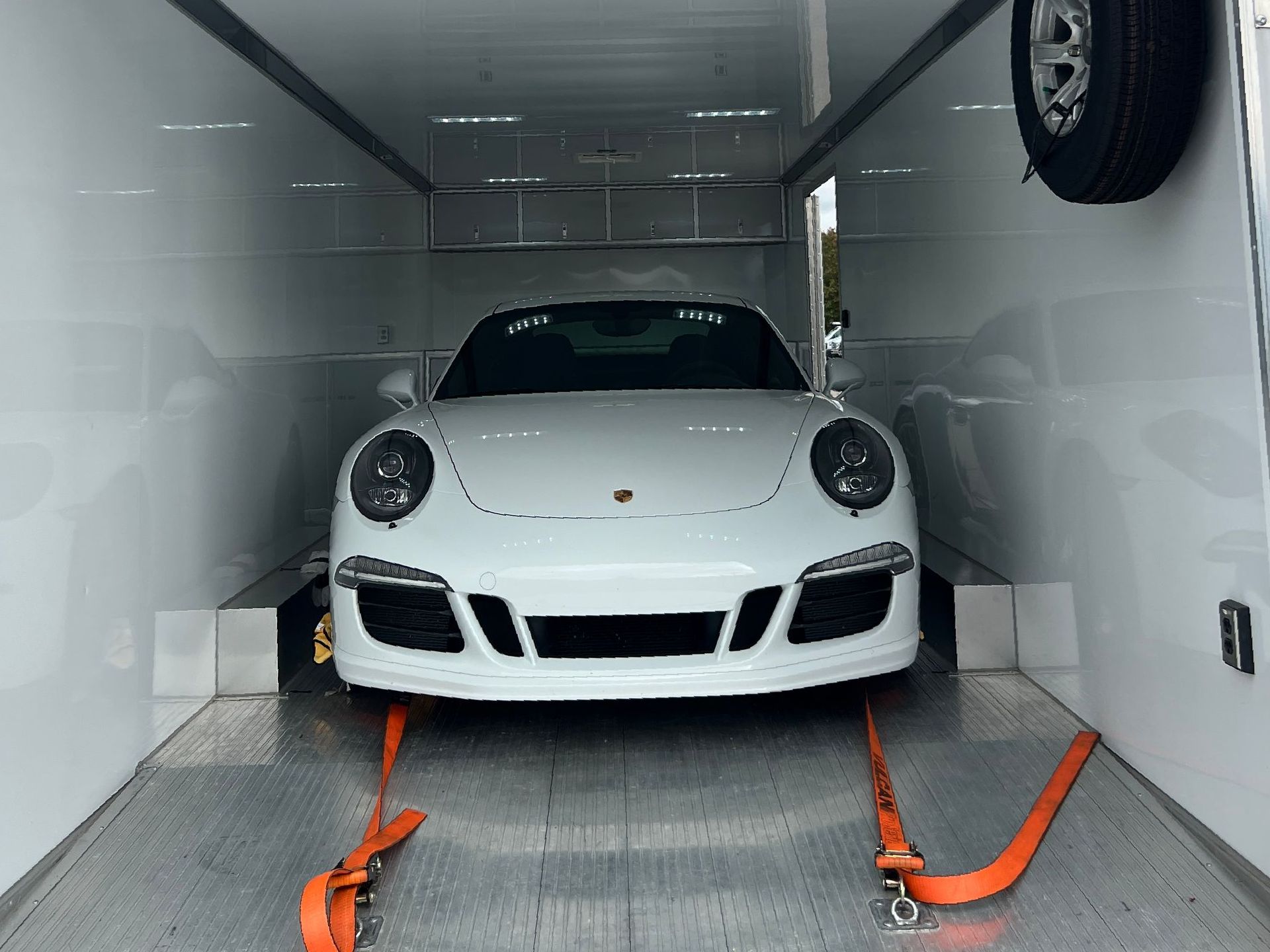 Transporting Vehicles with Enclosed Trailer