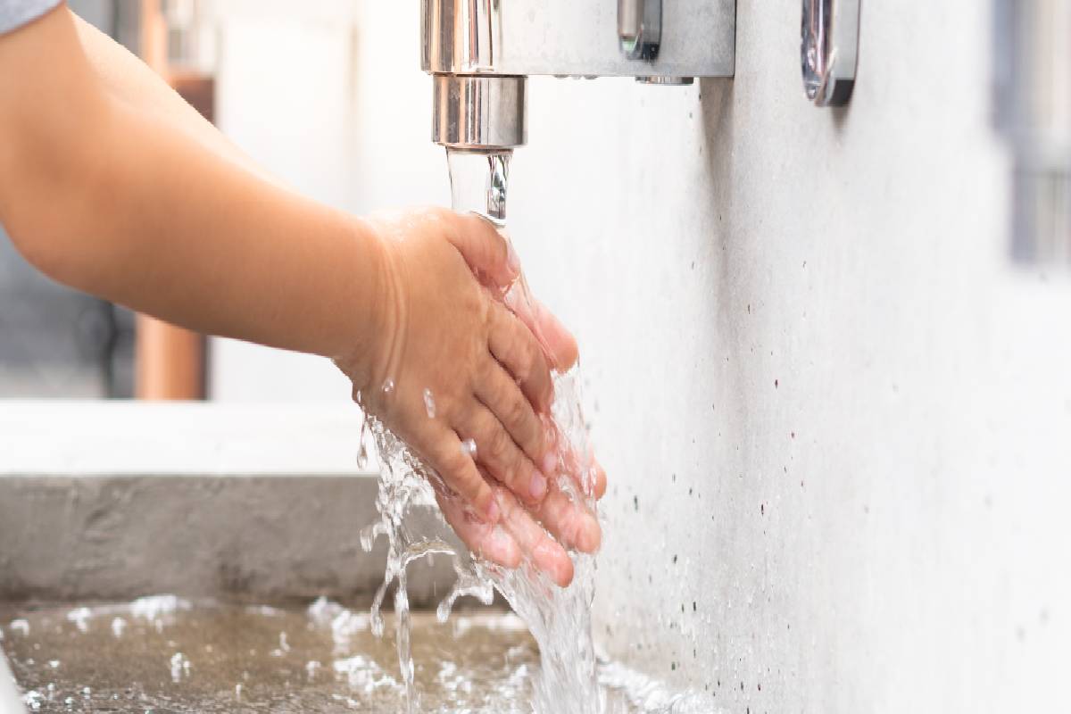 A child washes their hands at a faucet in a school near Harrodsburg, Kentucky (KY)