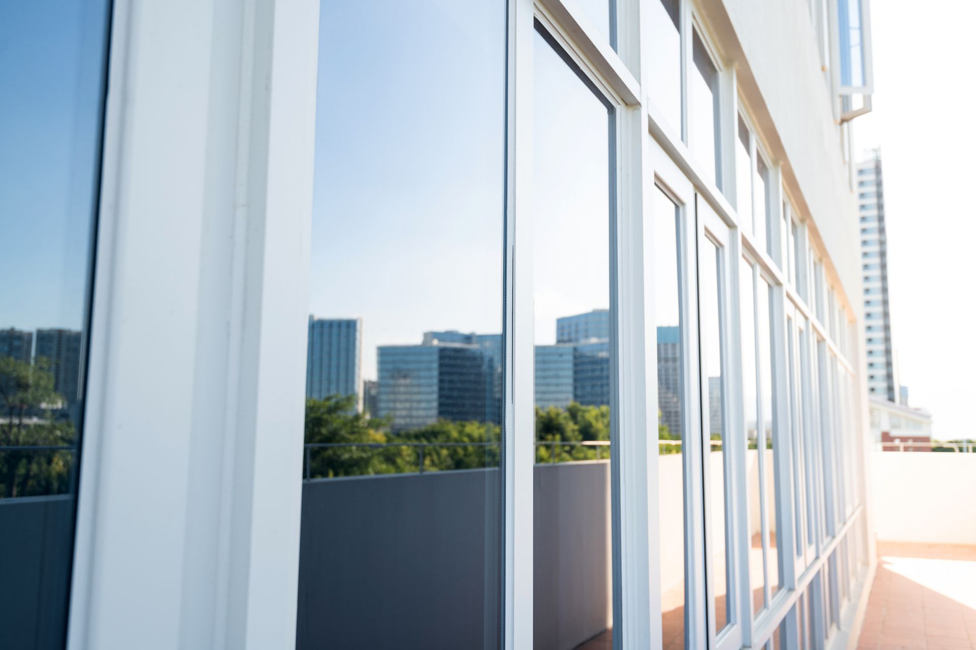 Tinted glass windows of a modern building. Tinted glass windows of a modern building.