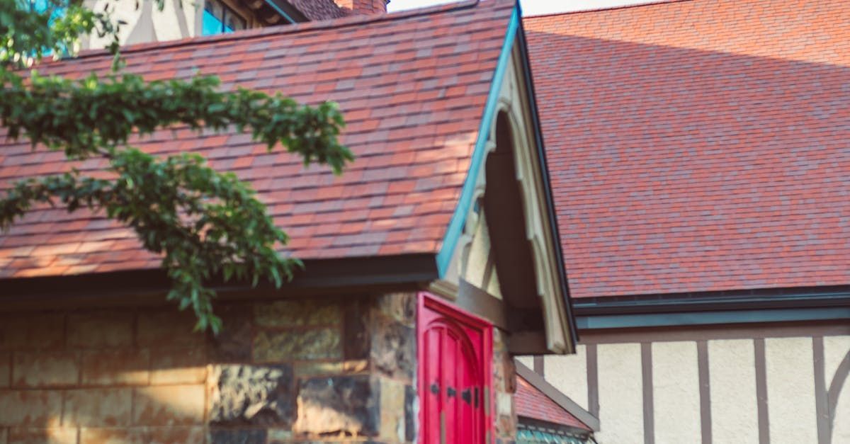 A house with a red roof and a red door.