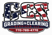 GCS Grading & Clearing Services logo with excavator, dump truck, and digging bucket in blue, black, and green