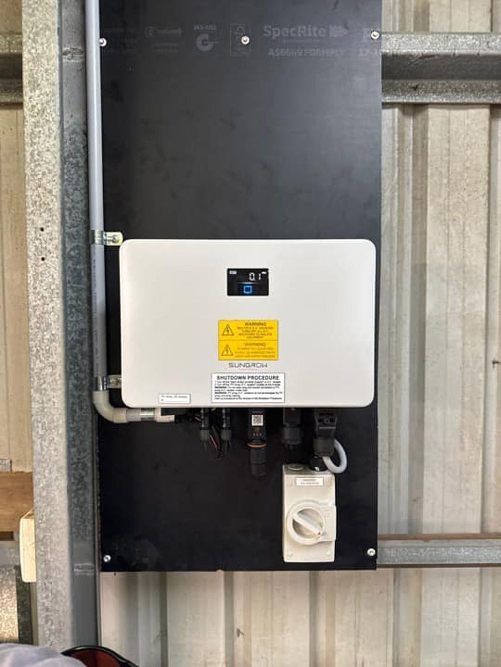 Sungrow solar inverter with digital display, installed as part of a Townsville solar power system