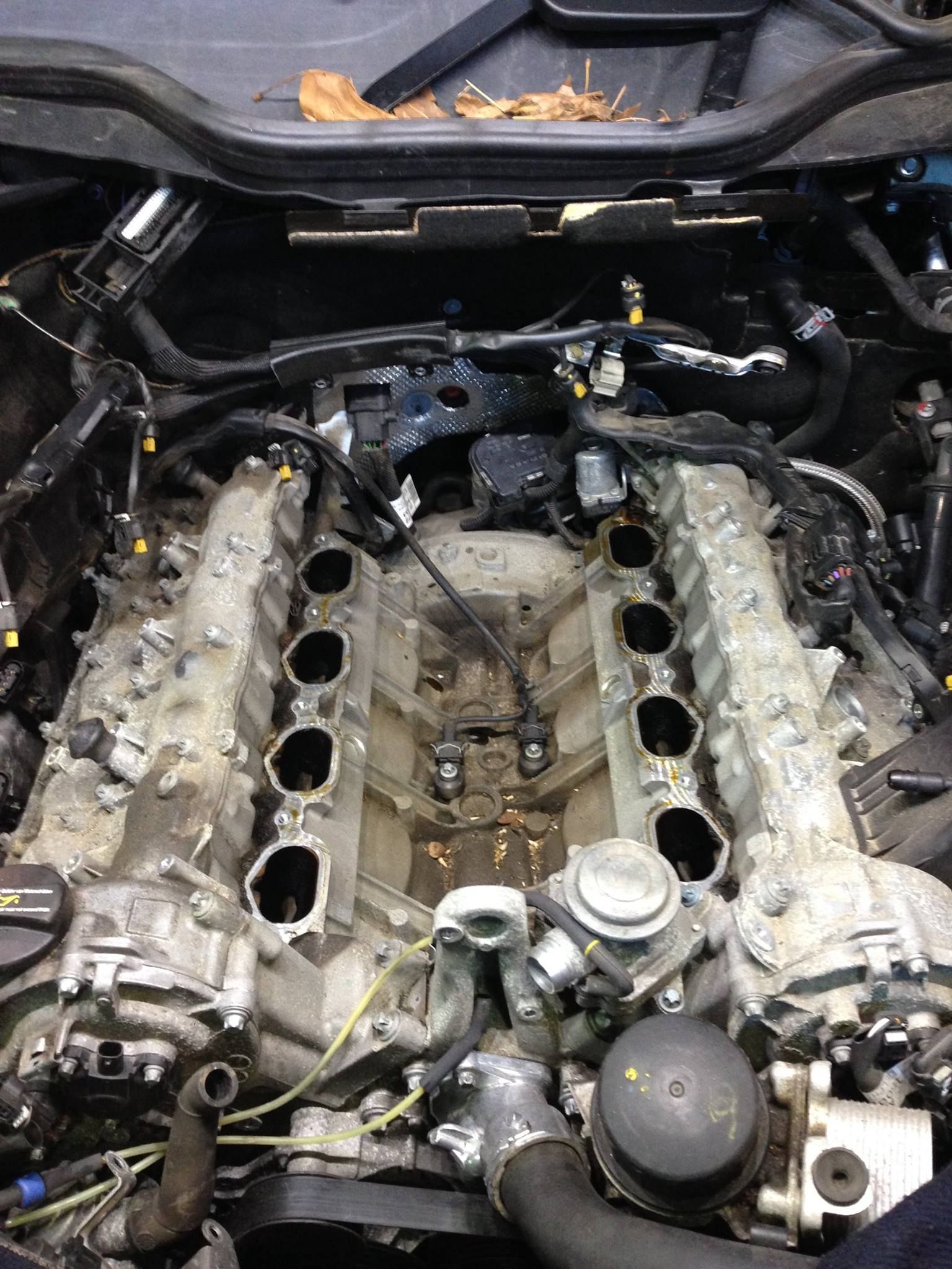 Engine Bay With Intake Components Removed During Repair | Neil's Motors Inc