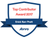 A shield with a blue ribbon and the words `` top contributor award 2017 '' on it.