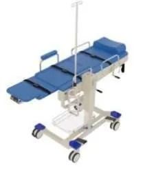 A blue and white hospital bed with wheels and an iv pole.