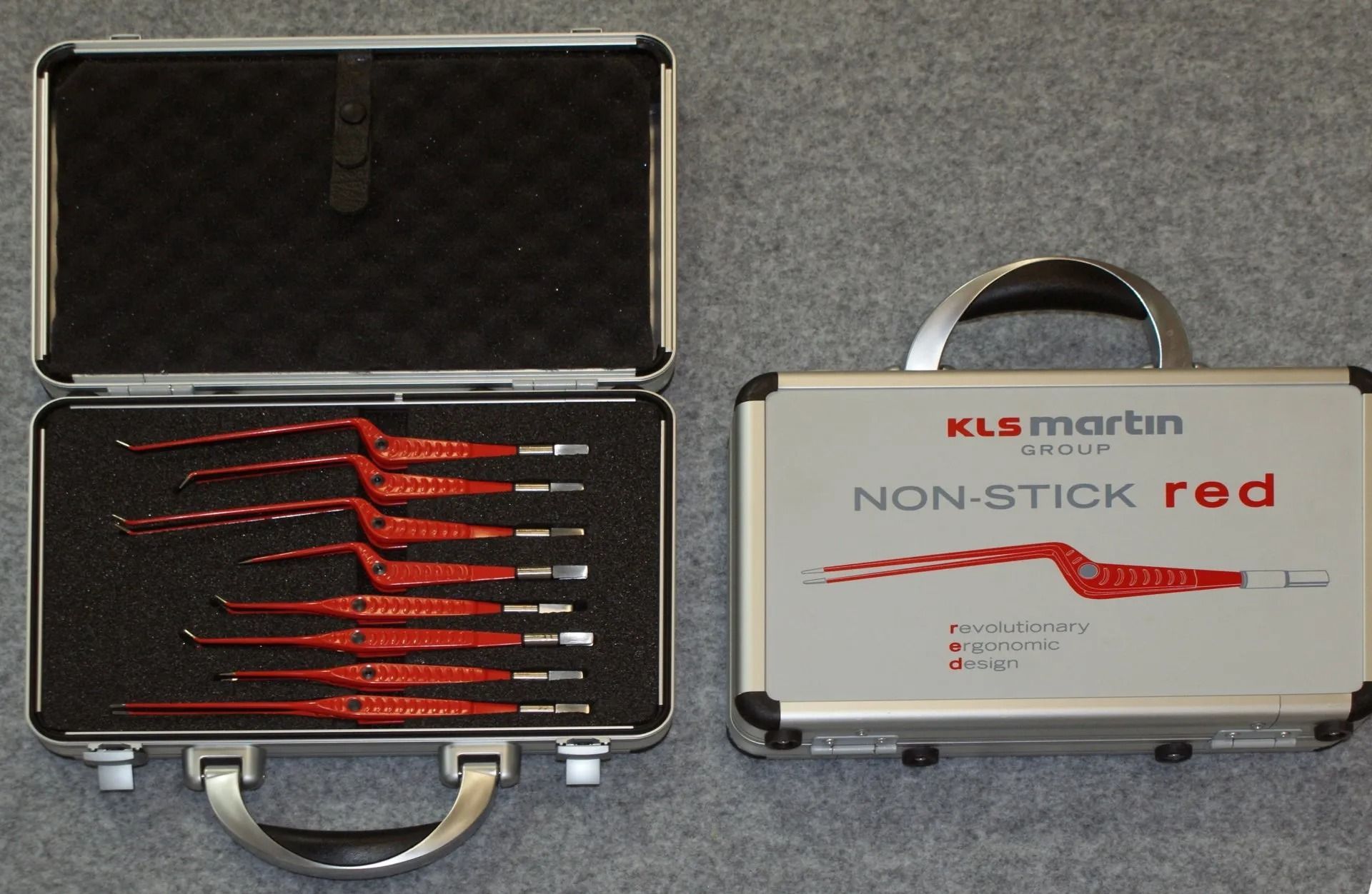 A briefcase that says kls martin non stick red