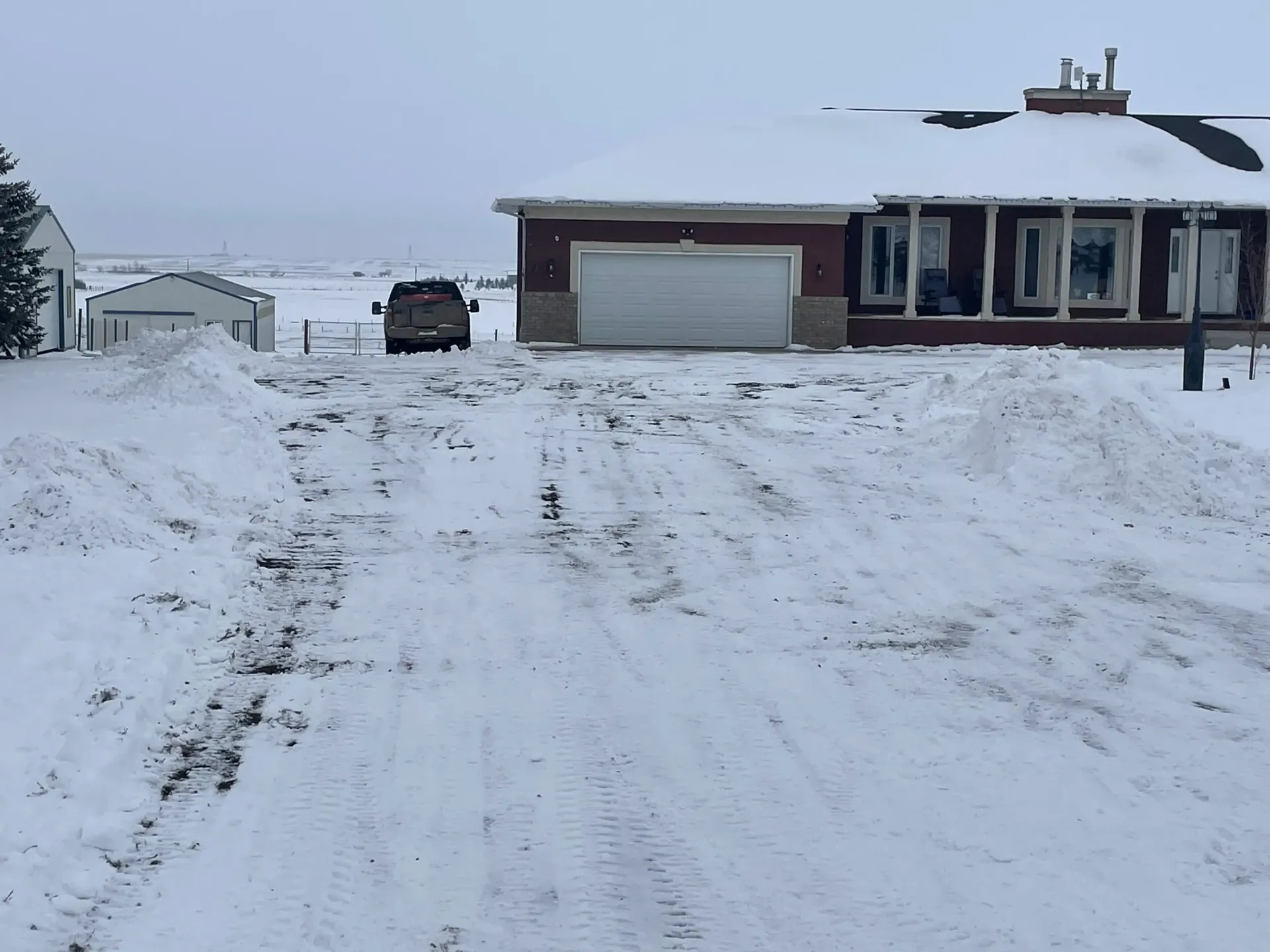 snow clearing of large driveway and parking area