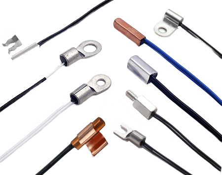 Assorted temperature sensors with various terminal types and wire colors.