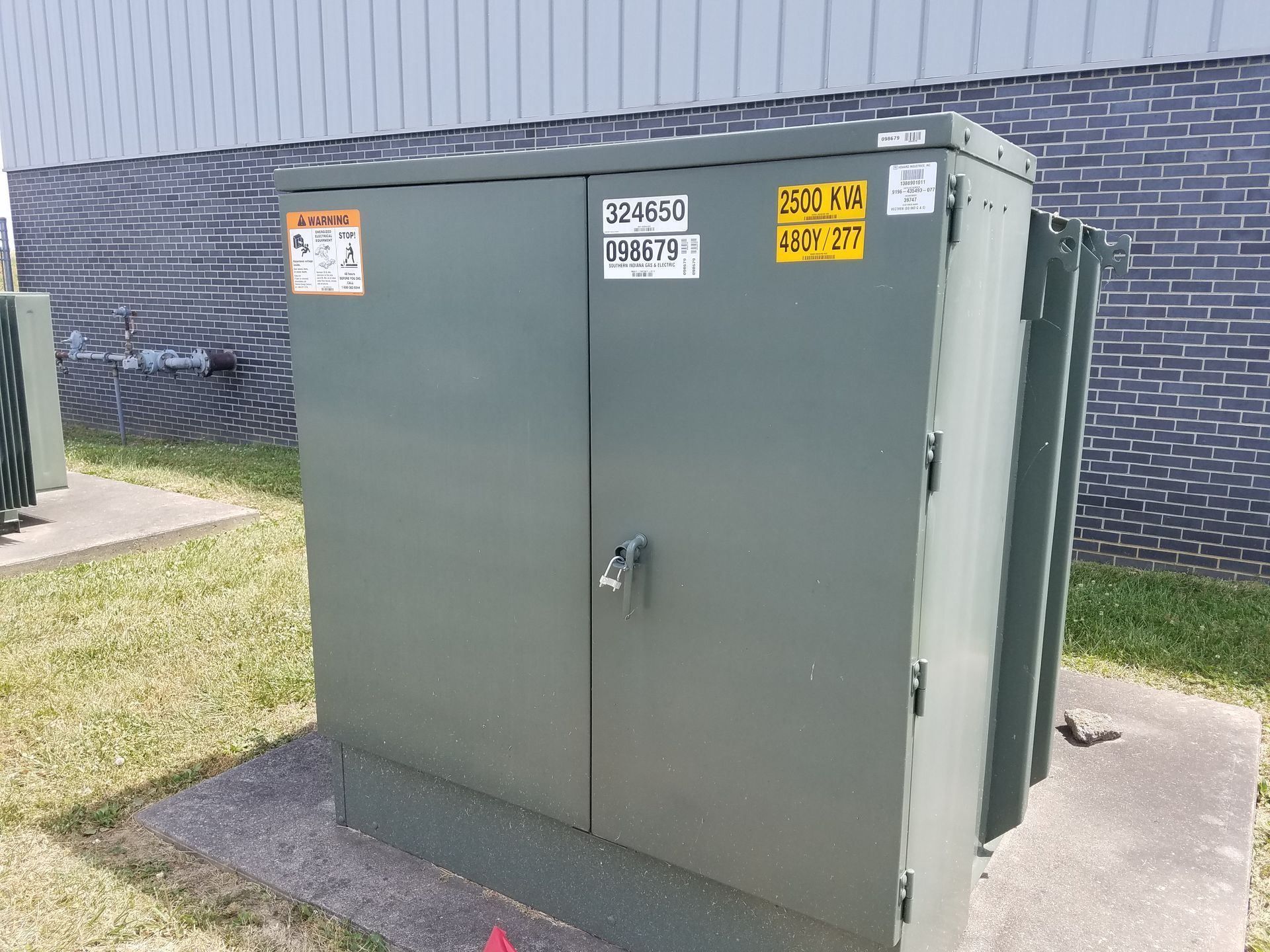 An electrical panel sitting outside of Vuteq