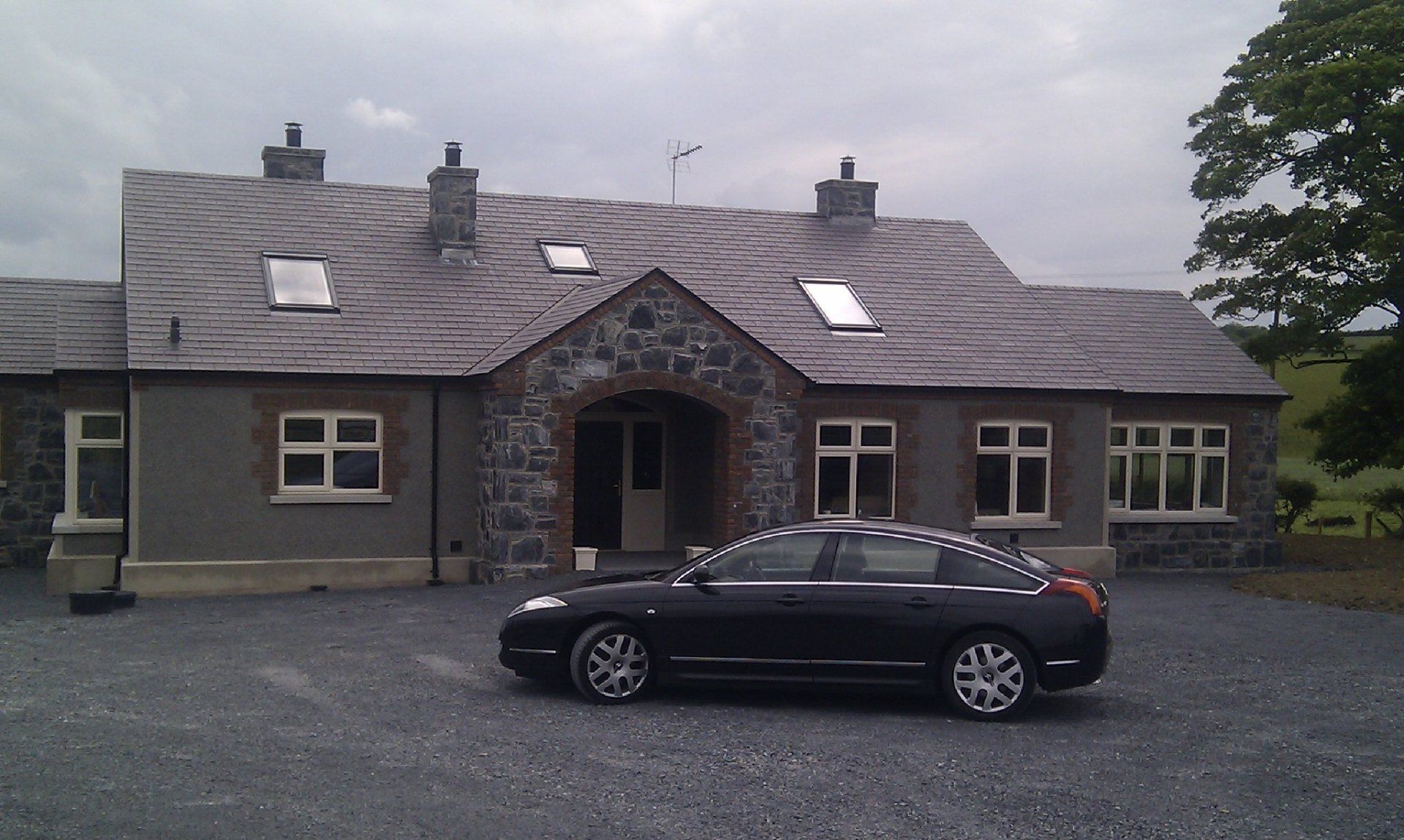Slate Roof Replacement on Stone Property in Manchester