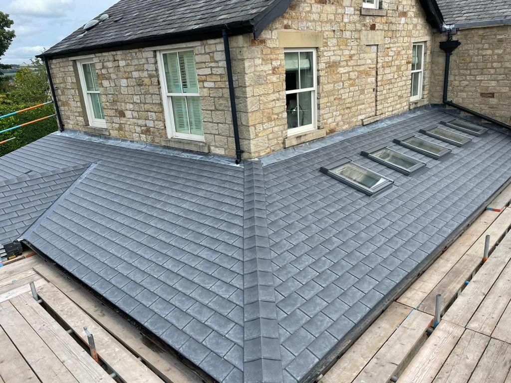 Full Roof Replacement on Stone Property
