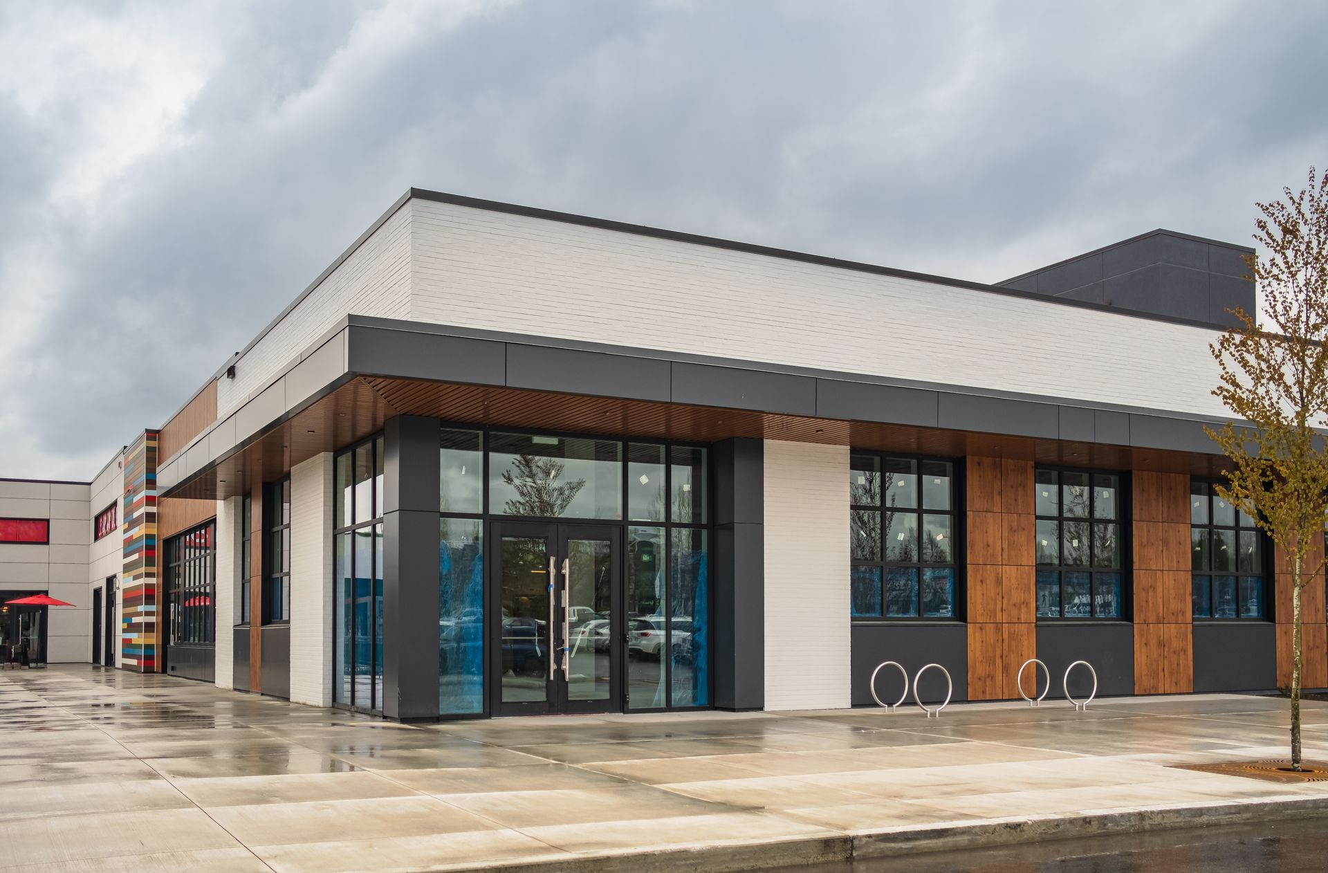 A large building with a lot of windows on a cloudy day. A large building with a lot of windows on a cloudy day.