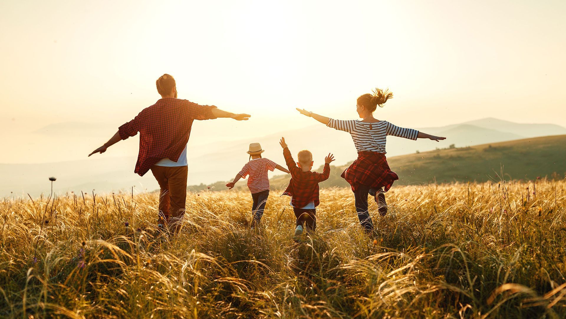 Family In Field — McMinnville, TN — Hoover & Son Insurance Agency