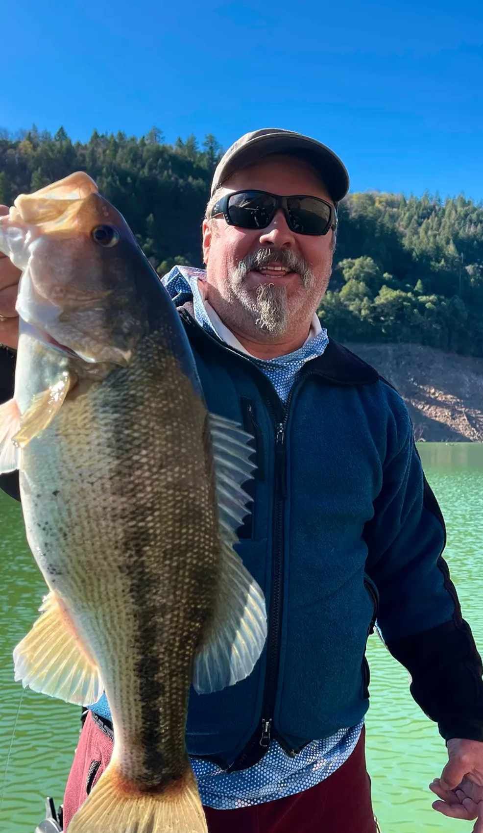 lake-shasta-bass-trout-fly-fishing Fly fisherman targeting bass and trout on a guided trip at Lake Shasta