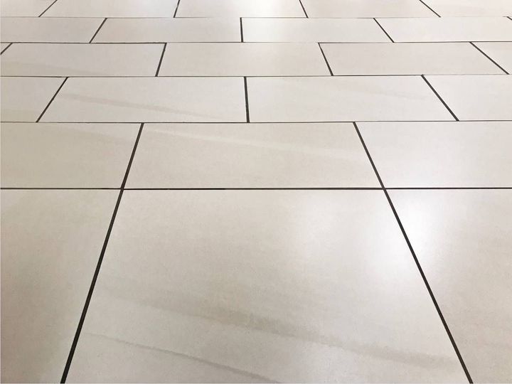 Ceramic floor tiles fitted across a ground floor