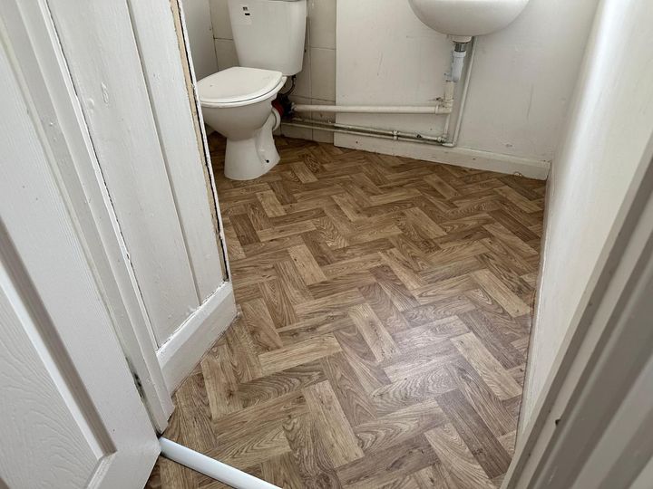 New luxury vinyl tile flooring fitted in a bathroom