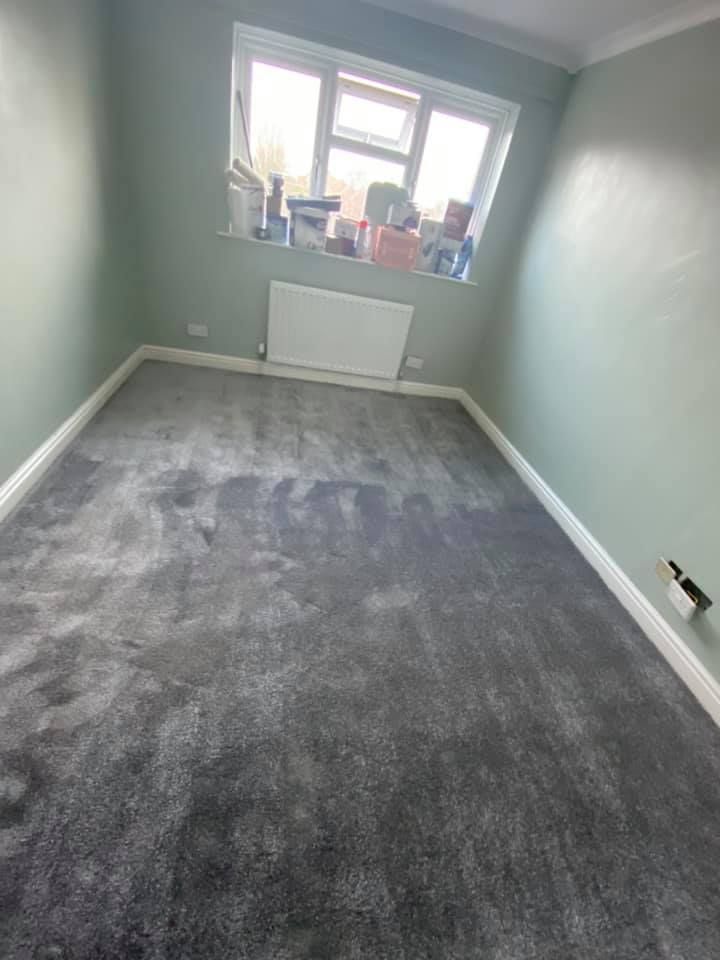 Newly fitted carpet in a bedroom