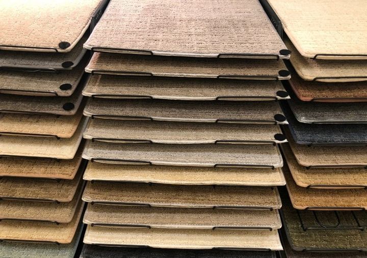 A selection of brown and beige carpet samples