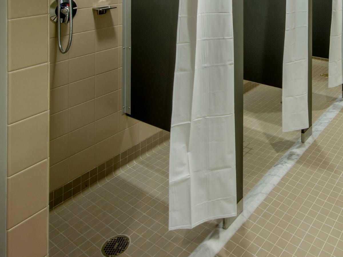 Derbyshire Flooring Specialists cap coving in a public shower room
