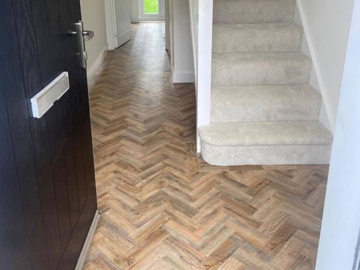 Wood effect herringbone luxury vinyl flooring fitted in a Derby home