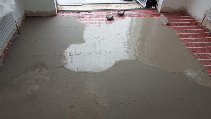 Electric underfloor heating being installed in a Derby home