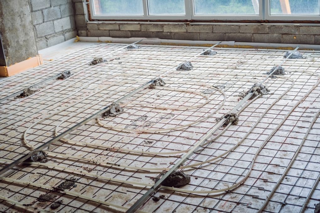 electric underfloor heating wires laid out in an upstairs bedroom for a house renovation in Derby