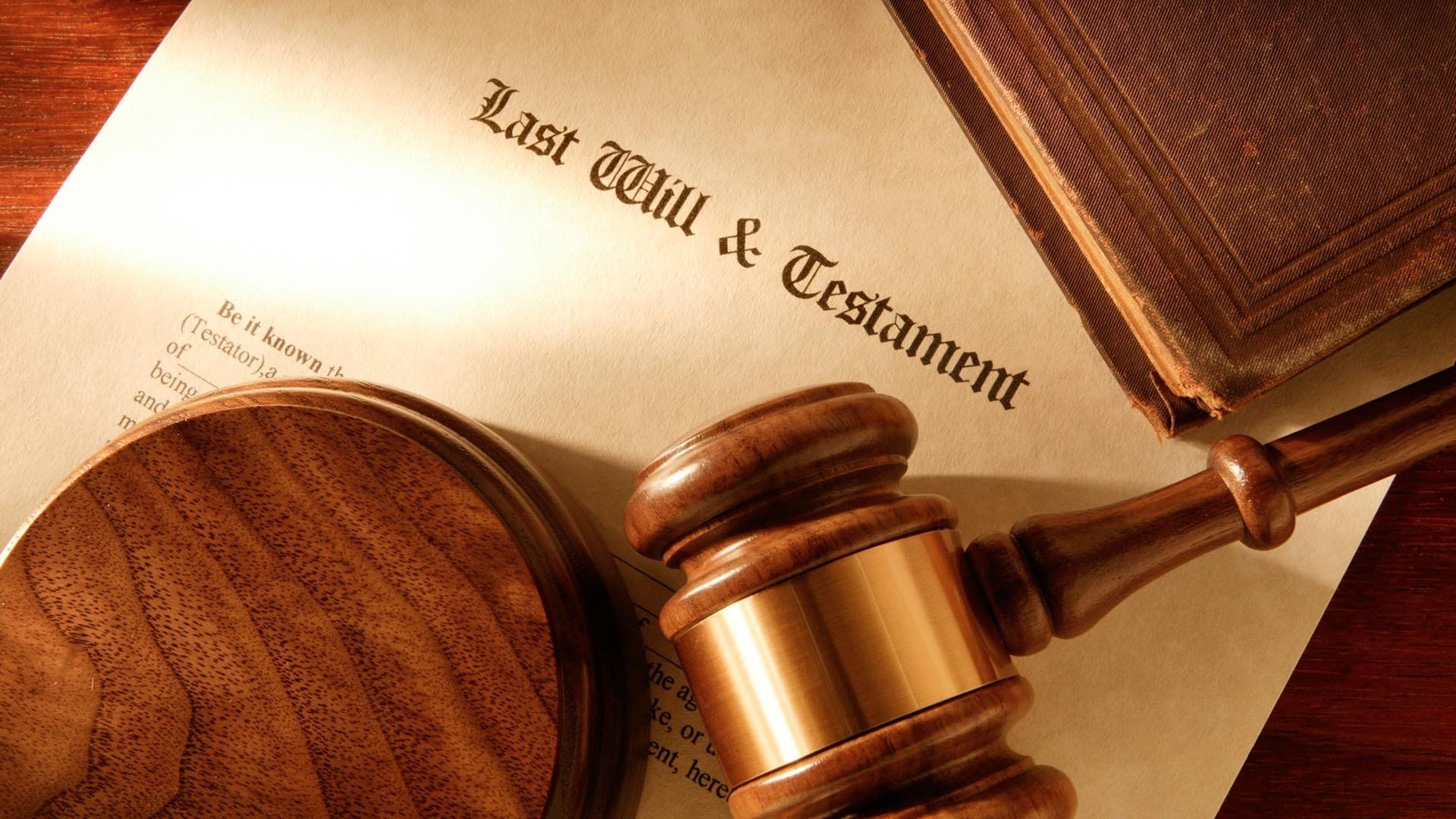 gavel lying on paper that says last will and testament