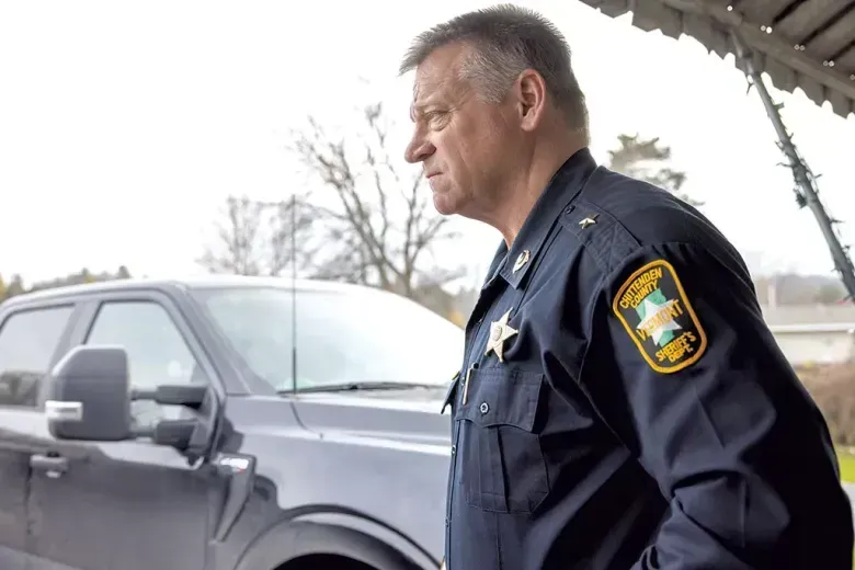 Dan Gamelin Chittenden County Sheriff standing beside black truck