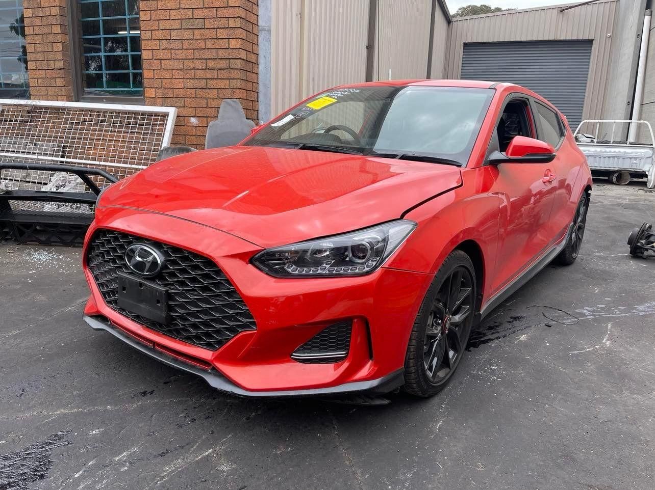 Hyundai Accent parked on side of road